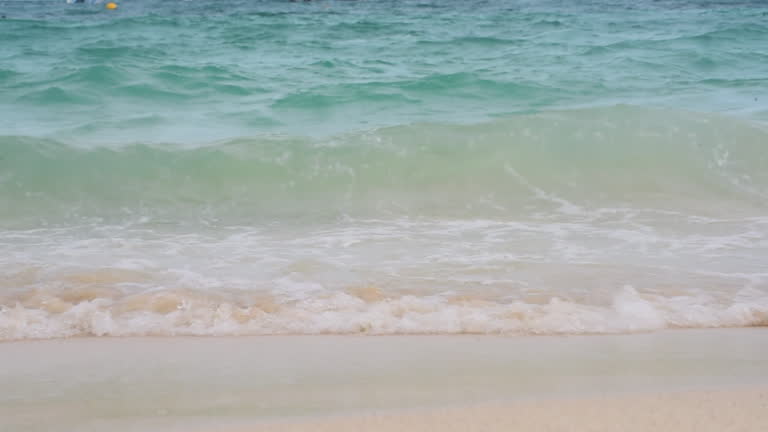 Blue sea white beach turquoise ocean wave coastal in tropical paradise landscape. Beautiful scene seascape marine coastline destinations. Tropical beautiful blue ocean lagoon lake travel summer time.