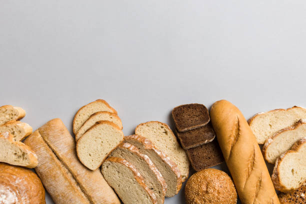 istock Homemade natural breads. Different kinds of fresh bread as background, top view with copy space 2149776041