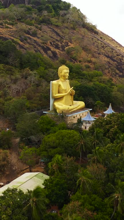 A Buddhist temple with a Buddha statue. Sri Lanka.