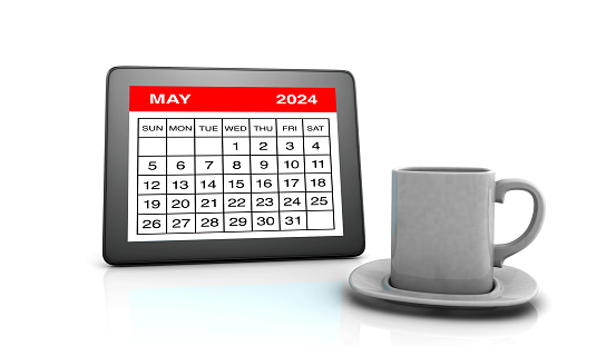 May 2024 calendar on Tablet PC and Coffee Cup