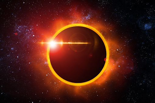 A spectacular solar eclipse captured against the vast backdrop of outer space, showcasing the glowing corona as the moon obscures the sun.