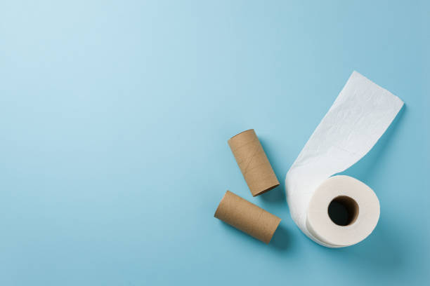 istock Top view of toilet paper roll on blue background 2149784425