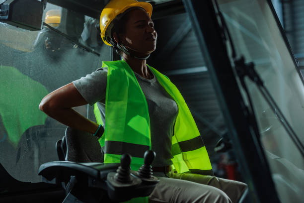istock Woman crying because of her back pains at work 2149784427
