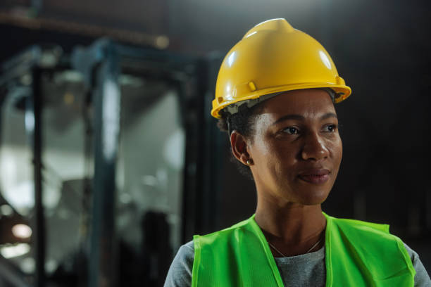 istock Customs warehouse female worker wearing her yellow hardhat 2149784643