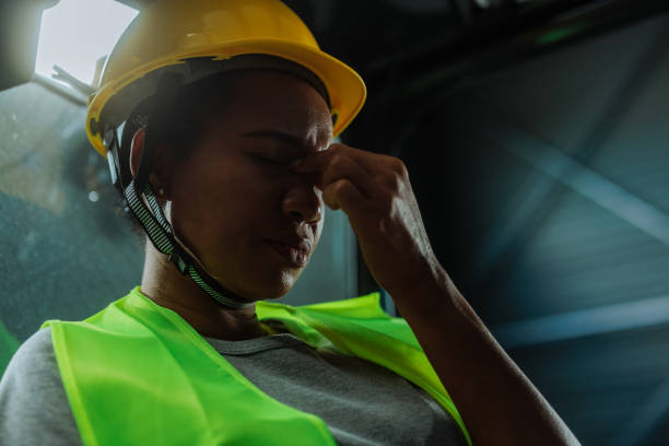 istock Anxious warehouse worker crying at her job 2149784697