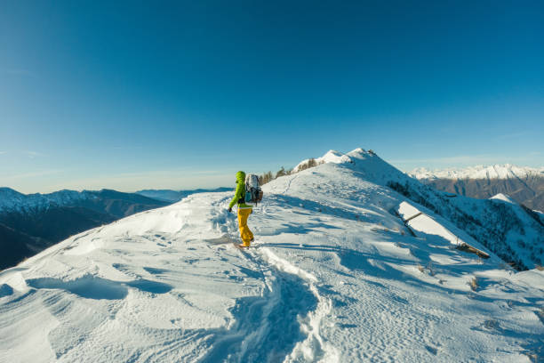 istock Male hiker on snowy ridge 2149786166