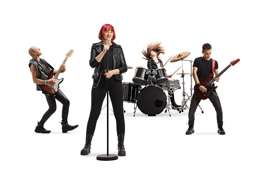 Rock band performing with a lead female singer isolated on white background