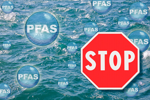 Stop dangerous PFAS Contamination - They are now everywhere - Perfluoroalkyl and Polyfluoroalkyl Substances, synthetic organofluorine chemical compounds concept with stop sign.