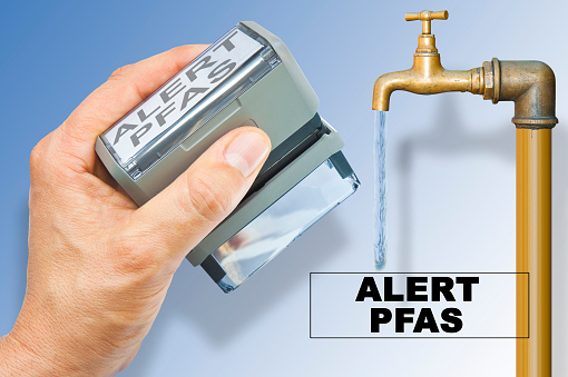 PFAS Contamination of Drinking Water - Alertness about dangerous PFAS per-and polyfluoroalkyl substances presence in potable water - Concept image with faucet