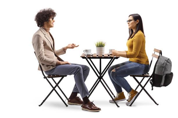 istock Young man sitting in a cafe and having a conversation 2149787699