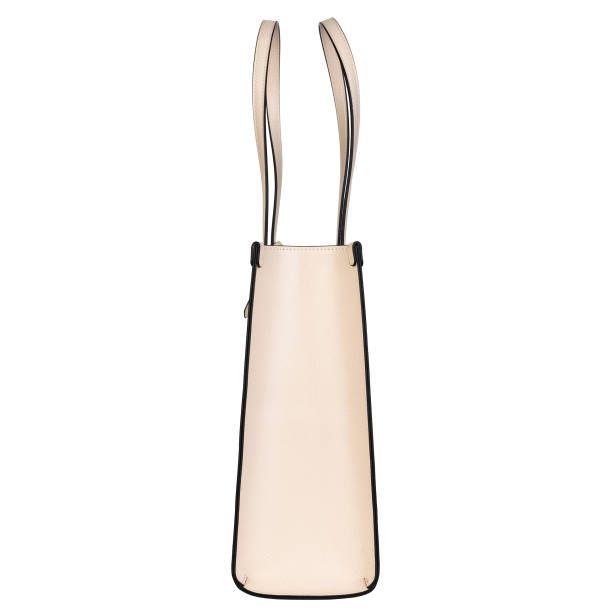 Elegant beige fabric bag with straps. Side shot