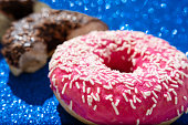 Tasty pink and chocolate doughnut