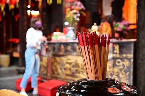 Taiwan-04.05.24: Fortune sticks at Shilin Cixian Temple for divination. Inscribed with numbers for verses. After worship, worshippers pray, then draw a stick, and interpret the verses for guidance.