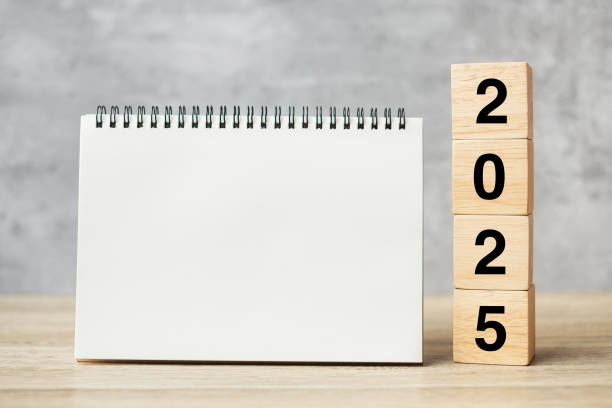 istock 2025 Happy New Year with blank notebook and wooden number. countdown, Resolution, Goals, Plan, Action and Mission Concept 2149791837