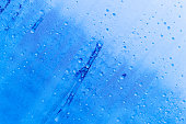 A blue background with frozen water droplets on it