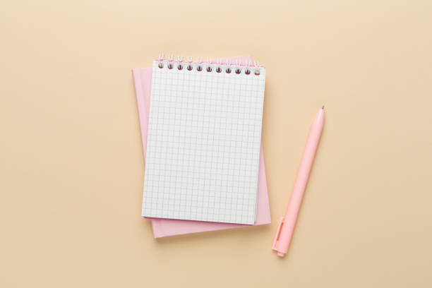 istock Notebooks with stationery on color background, top view 2149792867