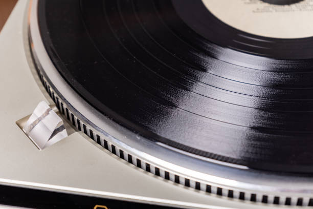 istock vintage vinyl player with amplifier and loudspeakers on white table 2149794044