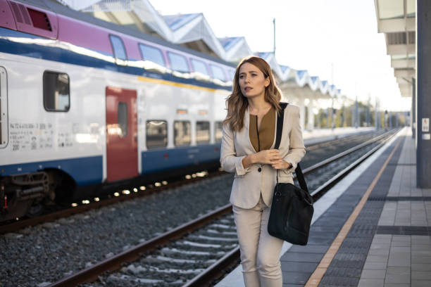 istock A businesswoman waiting on the concourse for a train 2149794153