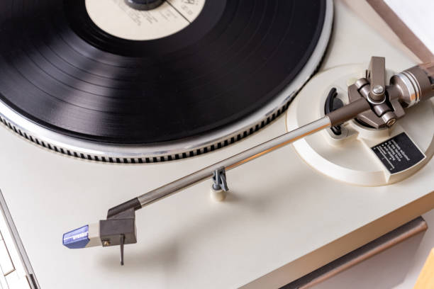 istock vintage vinyl player with amplifier and loudspeakers on white table 2149794171
