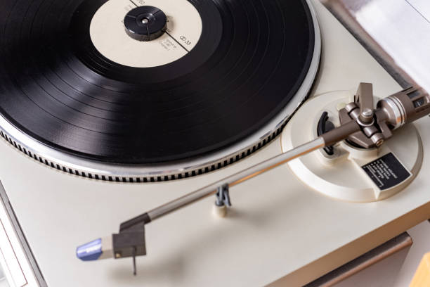 istock vintage vinyl player with amplifier and loudspeakers on white table 2149794183
