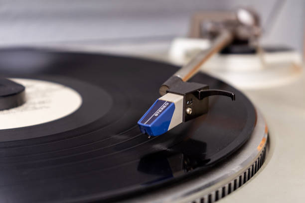 istock vintage vinyl player with amplifier and loudspeakers on white table 2149794205