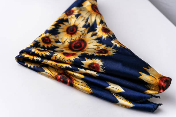 Woman's scarf with sunflowers on white background