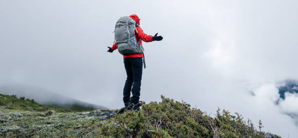 istock Hiking woman on high altitude mountain top 2149795688