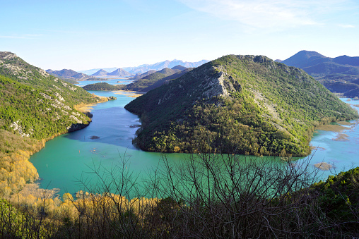 The bright colors of Montenegrin nature - a magnificent view of the mountains, Lake Skadar and the Crnojevica River
