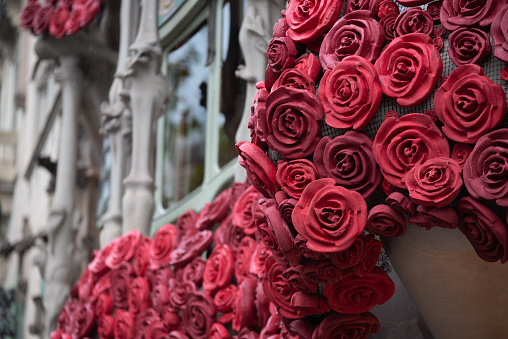 The Sant Jordi day in the street of Barcelona Spain with flowers, books, roses