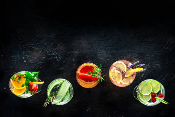 istock Fancy cocktails with fresh fruit. Gin and tonic drinks with ice at a party 2149798933