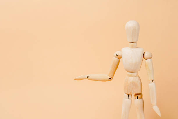 istock wooden man on beige background with place for text 2149799066