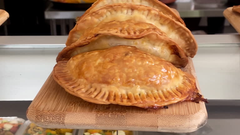 Rows of empanadas in take out food store