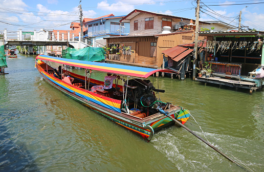 Thai Longtail Boat Called Rua Hang Yao for Sightseeing Running on Klong Bang Luang Market Canal, Bangkok Thailand