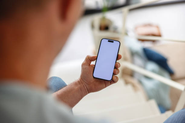istock Close-Up of Adult Using Smartphone with White Screen 2149802243