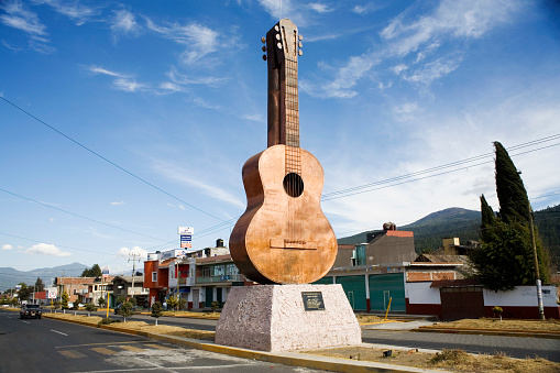 6th January. Paracho.Michoacan. Mexico. A huge sculpture of a guitar at the entrance to the town of Paracho, a town famous for the large number of Luthiers that reside and work there. The town has become even more famous since the release of the Disney film. \