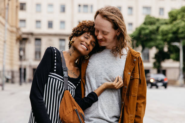 istock Affectionate couple enjoying a romantic moment on city streets 2149805622