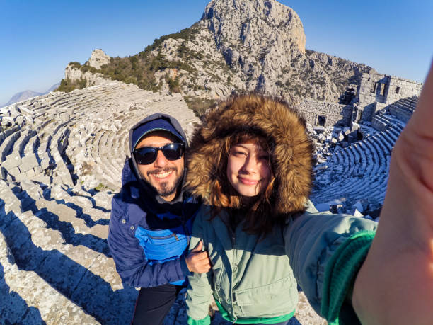 A couple visiting the ancient city during the snow season