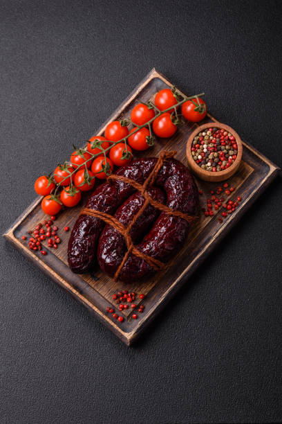 istock Delicious black blood sausage or black pudding with spices and herbs 2149806014