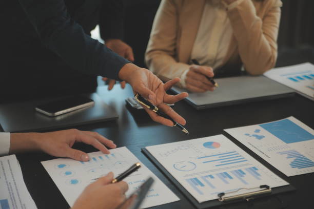 istock Business team collaboration discussing working analyzing with financial data and marketing growth report graph in team, presentation and brainstorming to strategy planning making profit of company. 2149806941