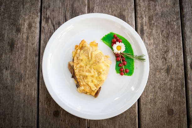 Plate of rosti at an outdoor cafe, Monte Tamaro