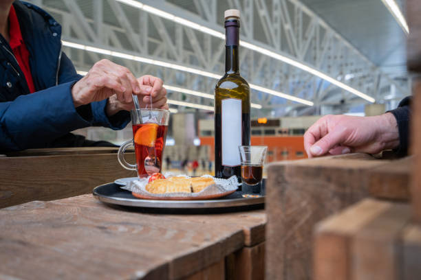 Senior couple enjoy meal, Monte Tamaro
