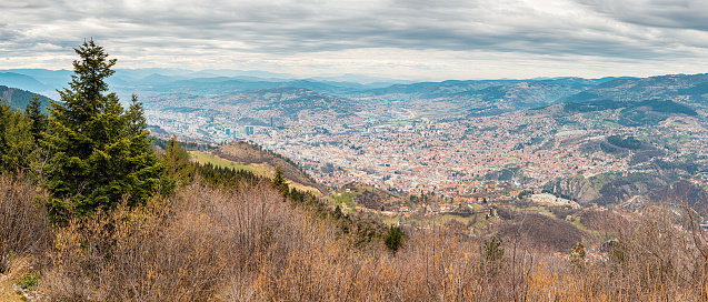 A captivating aerial view of Sarajevo's cityscape nestled amidst the scenic hills of Bosnia and Herzegovina.