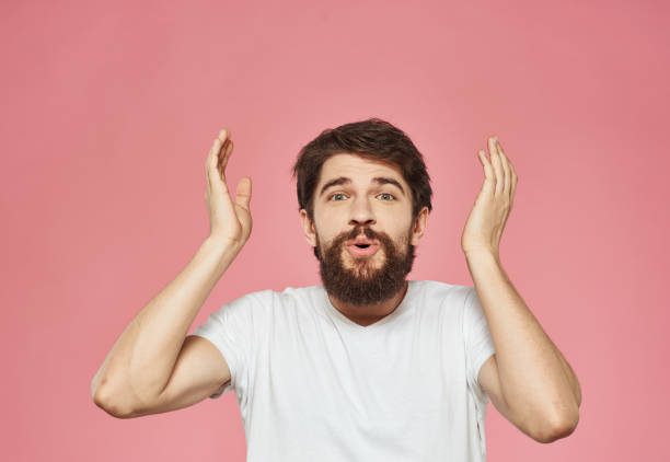 istock Energetic man on pink background fun cropped view 2149812926