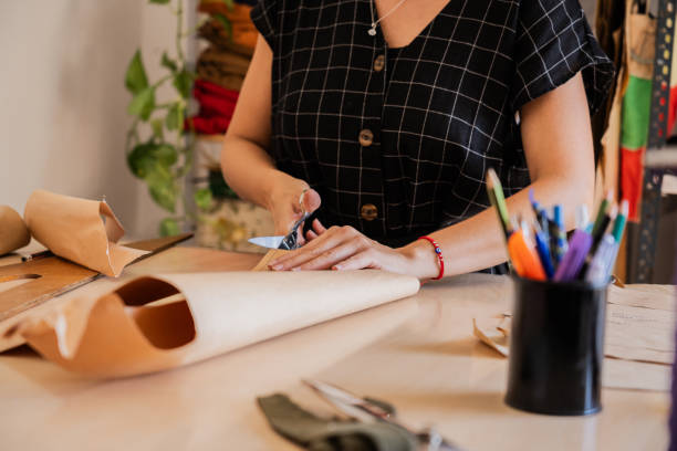 istock Close-up of a woman using scissors on an atelier 2149812979