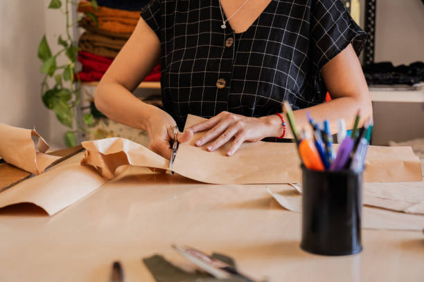 istock Close-up of a woman using scissors on an atelier 2149813002