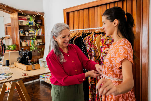 istock Seamstress taking measurements customer on an atelier 2149813056