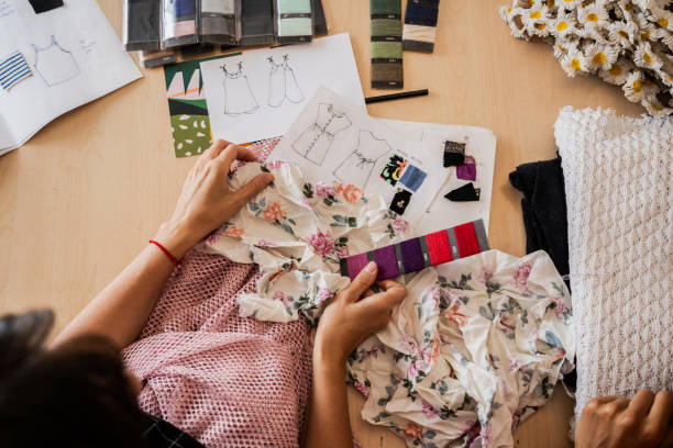 istock Seamstresses working on an atelier 2149813194