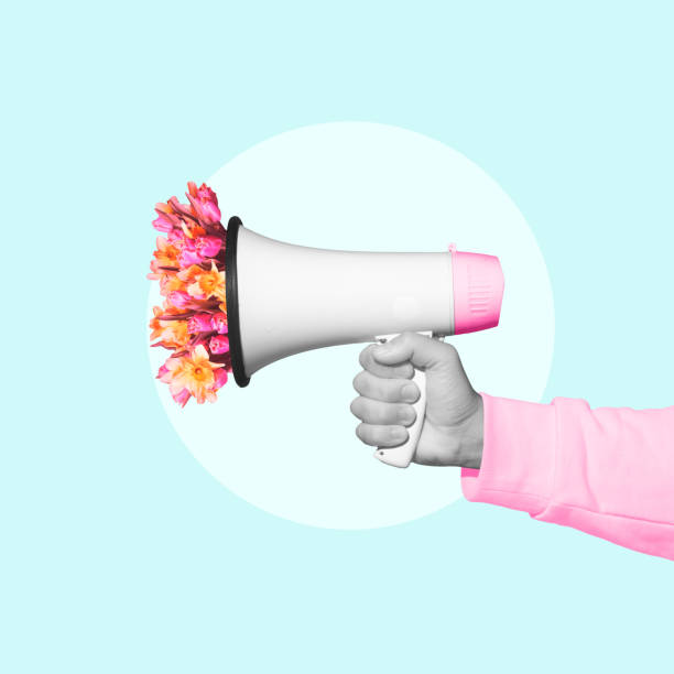 istock Contemporary art collage. Hand holding megaphone with blooming flowers inside. symbolize potential for positive change arising from communication. 2149813528