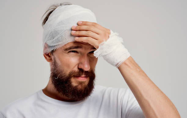 istock patient with bandaged head health problems discontent trauma center 2149816641