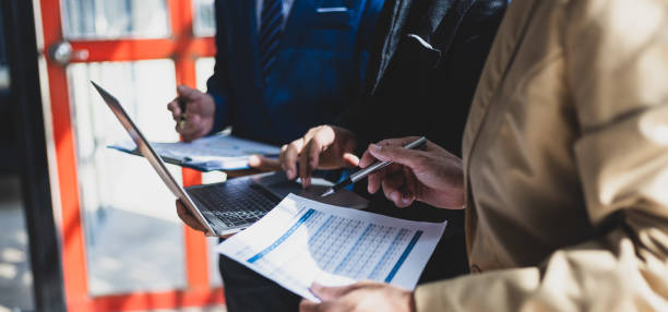 istock Colleagues, business partners are discussing business project work planning. 2149817635